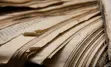 Stack of old newspapers.