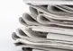 Stack of newspapers.
